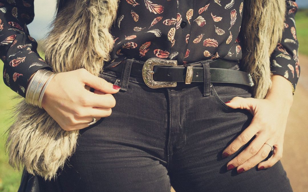Modern cow-girl and a vintage buckle belt