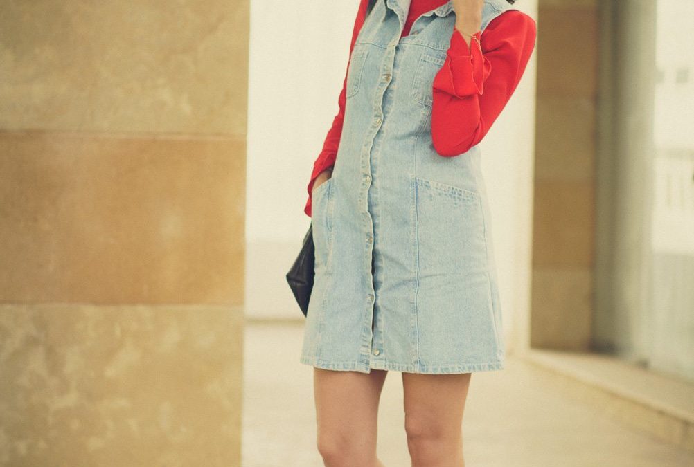 Spring layers: denim dress and red ruffle sleeves